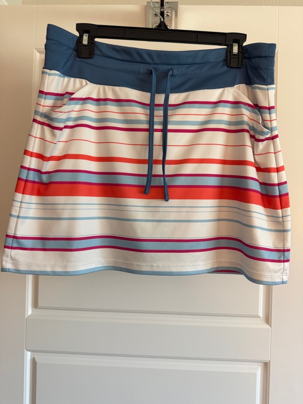 Performance Stripe Golf Skort - Blue and Orange Stripe